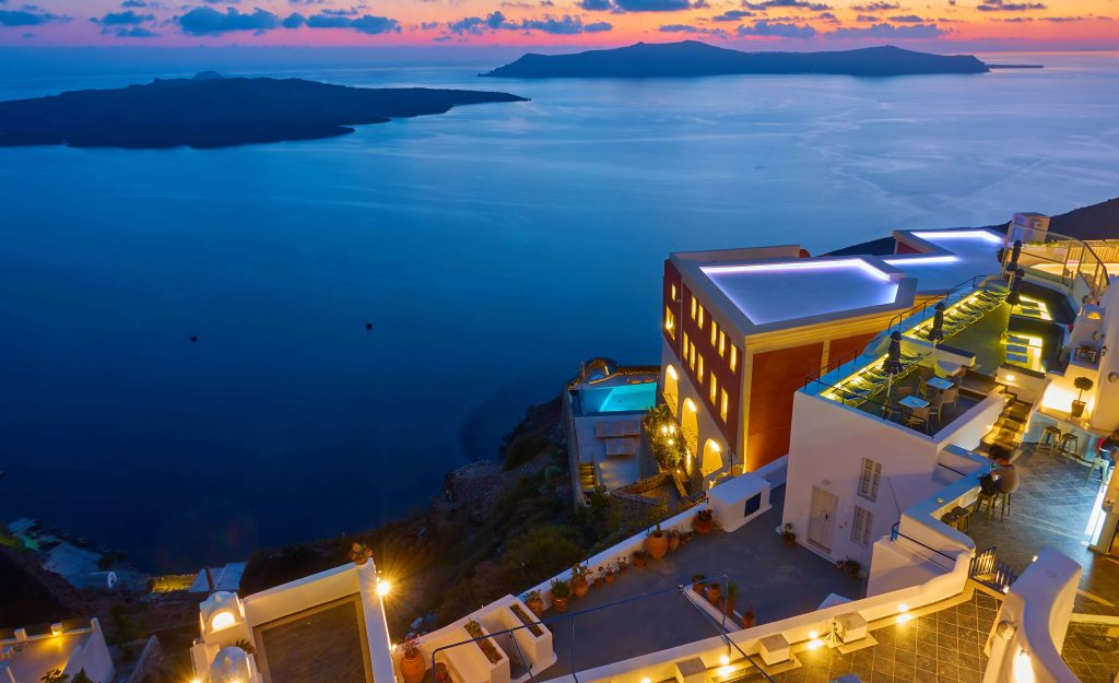 panoramic-view-with-illuminated-buildings-coast-santorini-island-aegean-sea-dusk-fira-greece-landscape~1 (1)