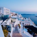 vertical-high-angle-shot-white-buildings-santorini-greece~1 (1)